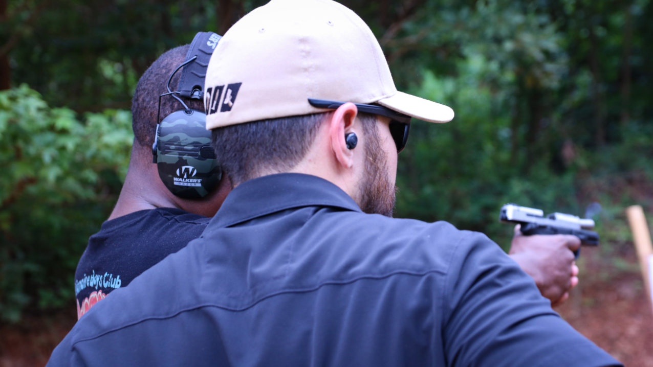 Concealed carry instructors with Triangle Self-Defense Training help students pass the shooting qualification